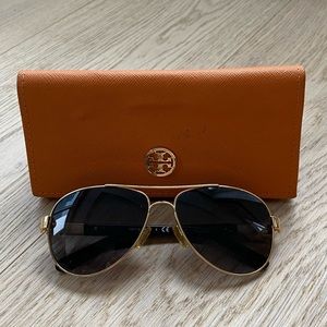 Tory Burch aviator sunglasses with gold wire frame, black lenses. includes case